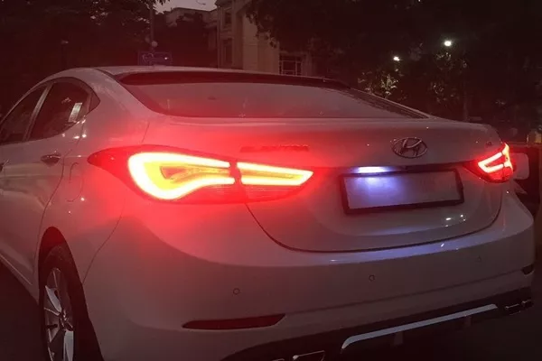 Car with illuminating taillight