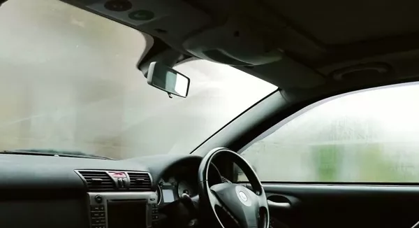 With fogged windows, it is difficult for the driver to see the road and the surroundings clearly Foggy windshield