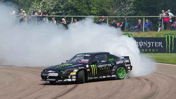 A Nissan S13 drifting/oversteering at a drift even in England.