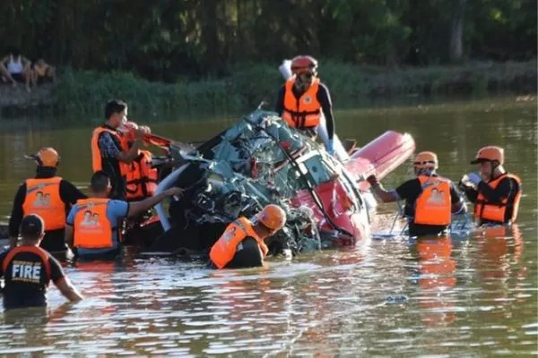 Pampanga DRRMO members inspecting a crashed helicopter PDRRMO members inspecting a crashed helicopter