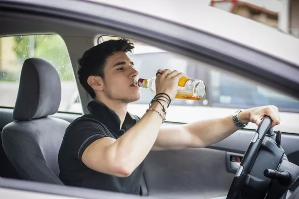 Driving while drinking liquor 