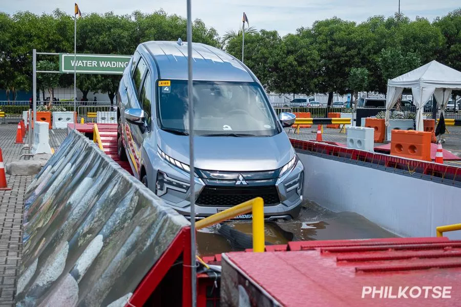 A picture of the Mitsubishi Xpander performing a wading test.
