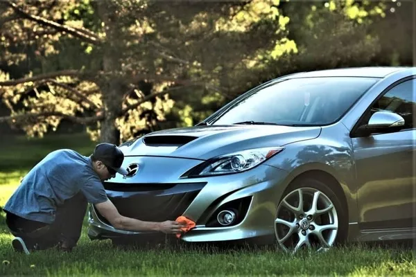 Man cleaning the car