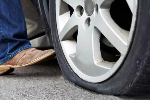 When your tires are underinflated, it causes the treads to wear out quicker flat tire