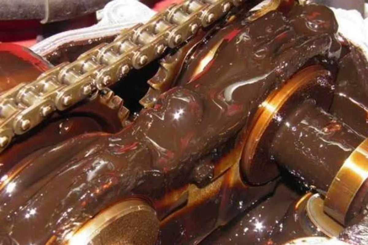 A picture of an engine covered in oil sluge