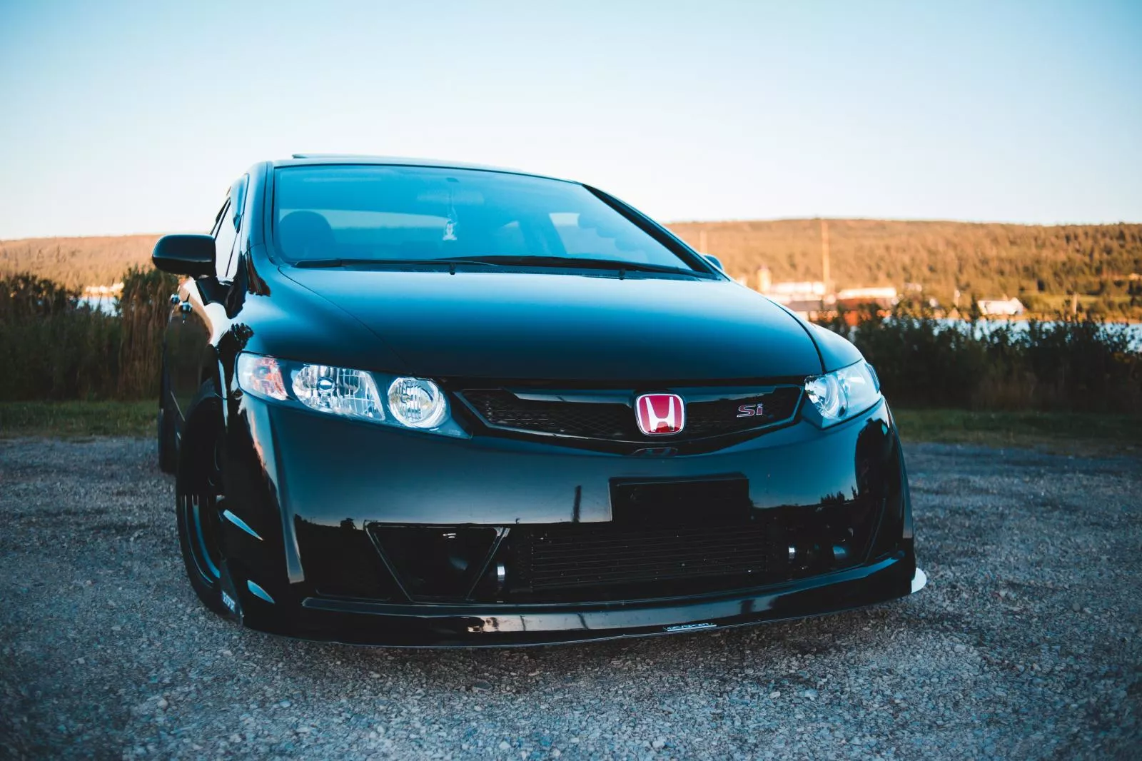 Black Honda vehicle front view