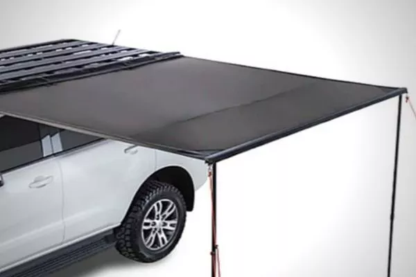 It's camping made easy A picture of the Rhino-Rack sun-seeker deployed