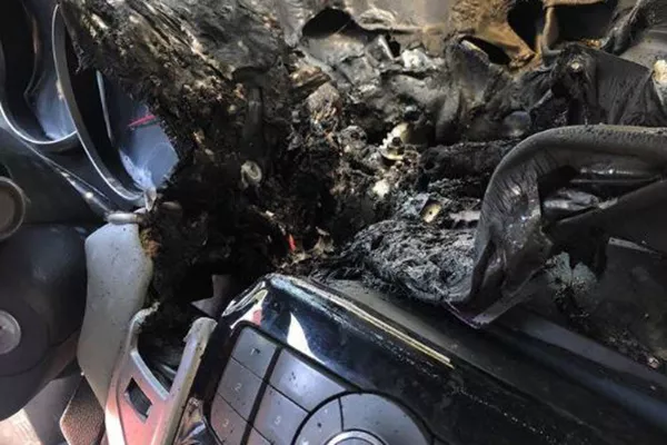 A picture of a car interior fire damage.
