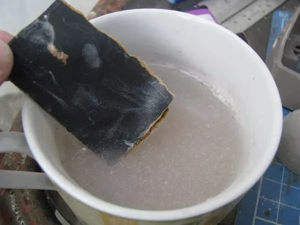 Sandpaper soaked in tap water