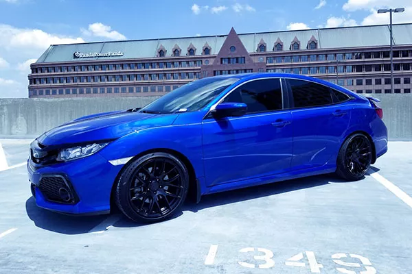 A picture of a Civic with a very flush 17x8 fitment.