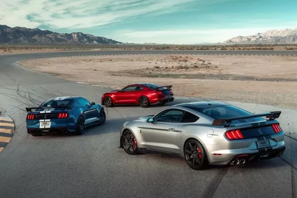 American Cars are up for a major comeback Ford Mustangs on a deserted Road