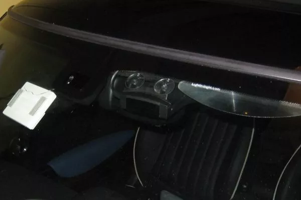 A picture of a car's windshield highlighting the frits