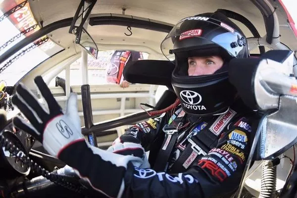 A picture of a female race car driver