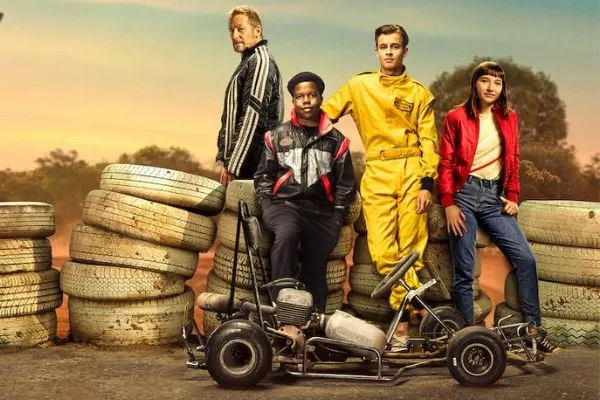 A picture of the Go Karts cast