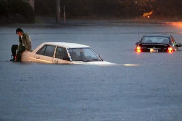car floating on flood