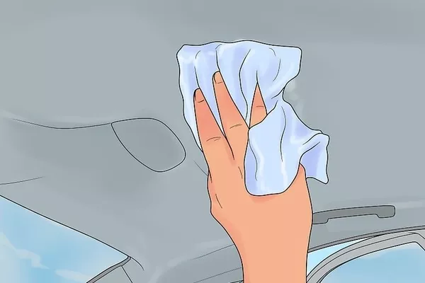 Blotting the area using a microfiber towel