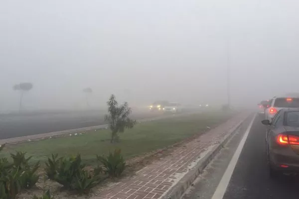 A picture of a very foggy road