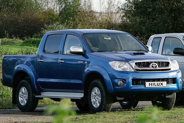 A picture of a blue Toyota Hilux