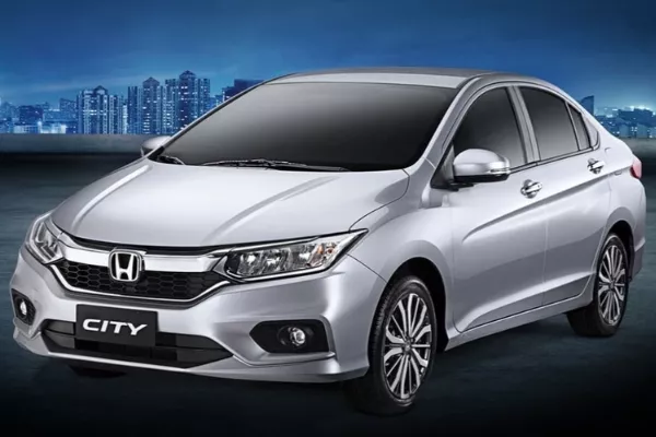 The 2020 Honda City A City with a blue background