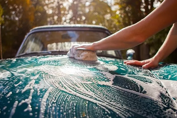 man washing the car