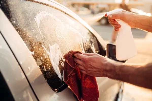 Man cleaning the window