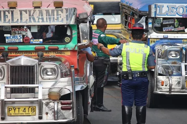 Enforcers doing their best to manage traffic traffic enforcer