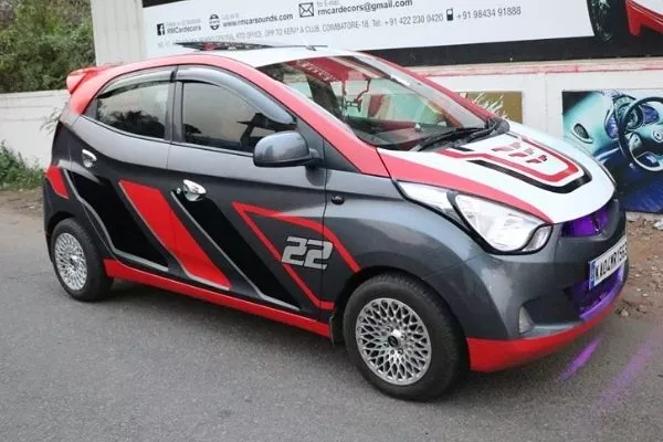 A picture of a Hyundai Eon with full vinyl wrap