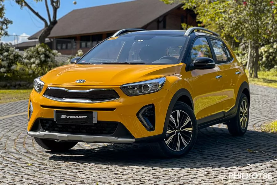 A Picture of the Kia Stonic on a city road