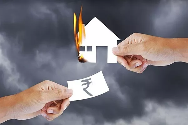 Man holding a burning paper