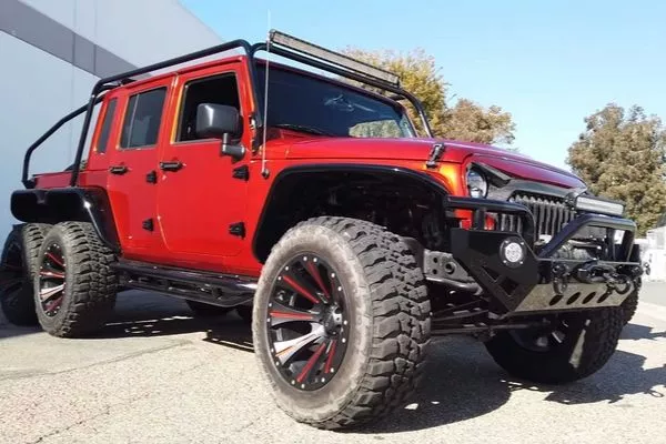 This extra-long Wrangler is America’s answer to the 6x6 G-Wagen A picture of the Jeep Wrangler 6x6 Hellcat V8 swap