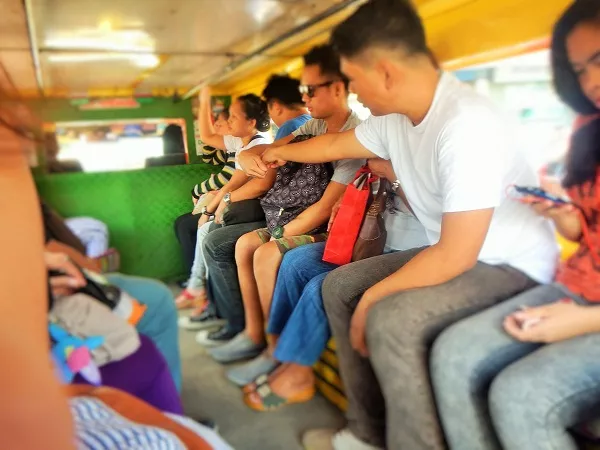 Friendly passengers on jeepneys