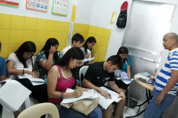 Student drivers of Jules Driving School taking a written exam. students at Jules driving school in pampanga taking exam