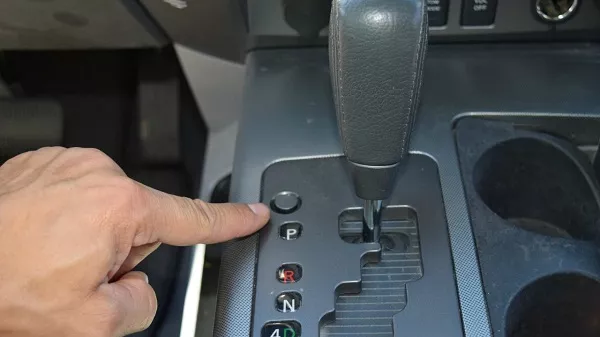 Put the gear selector in P to keep the power steady gear shift put in P