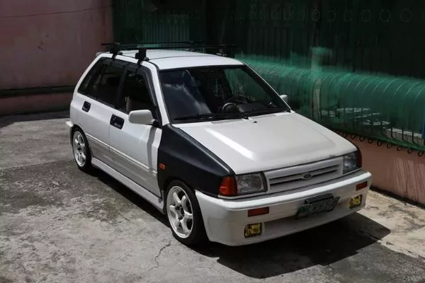 No matter what car you have the best wheels will make it look even better White wheels on Kia Pride