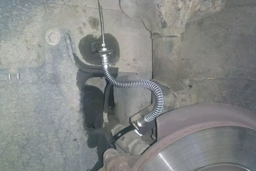 A picture of a leaky brake hose