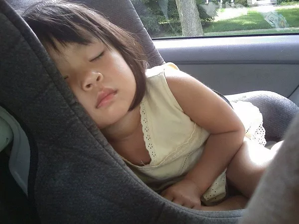 Sleeping child inside car