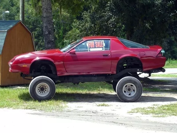 lifting the body or frame of the car