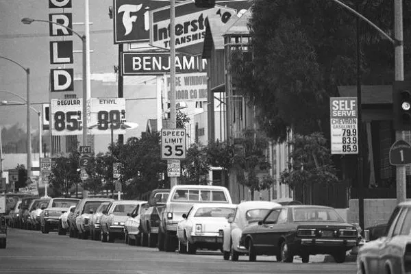 Lines of cars stretching for miles are commonplace Queue of cars lined up for fuel