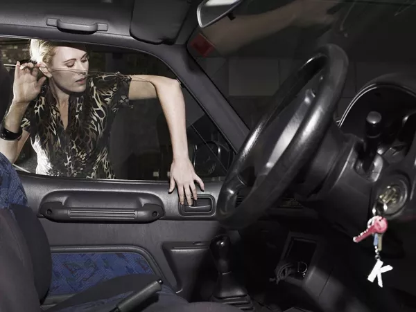 The locksmith’s service fee and his travel cost may or may not be fully covered in the car insurance A woman locked outside the car