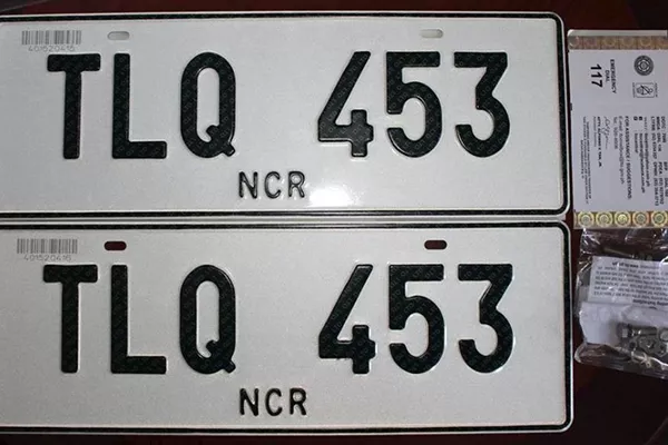 The current design of the Philippine plates. Always remember the digits on these for your registration renewal schedule A picture of a pair of plate numbers
