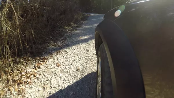  Crushed stones and car