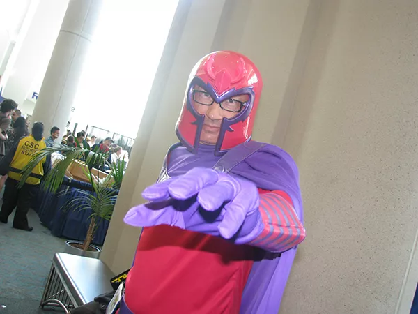 A man cosplaying as a famous mutant with magnetic powers.