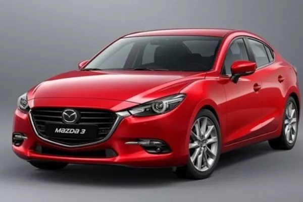A picture of a red Mazda 3 