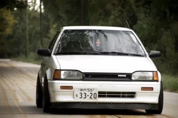 The right stance can turn any car into a super car mazda 323 perfect stance