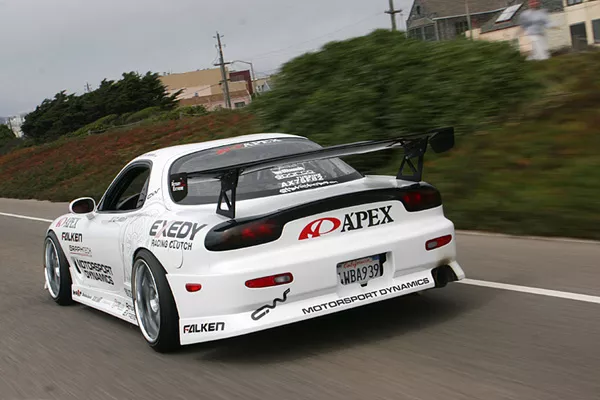 Mazda RX-7 on road 