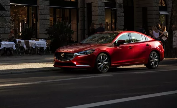 mazda 6 sedan on the road