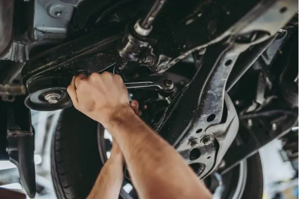 Mechanic fixing a car
