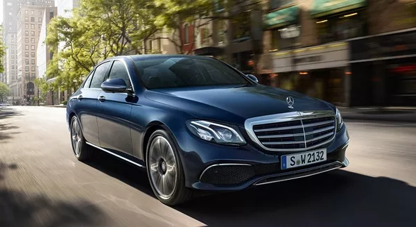 mercedes benz e class e 200 amg line on the road