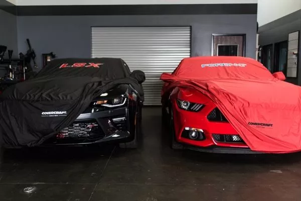 muscle cars in car cover