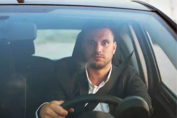 A picture of a worried driver